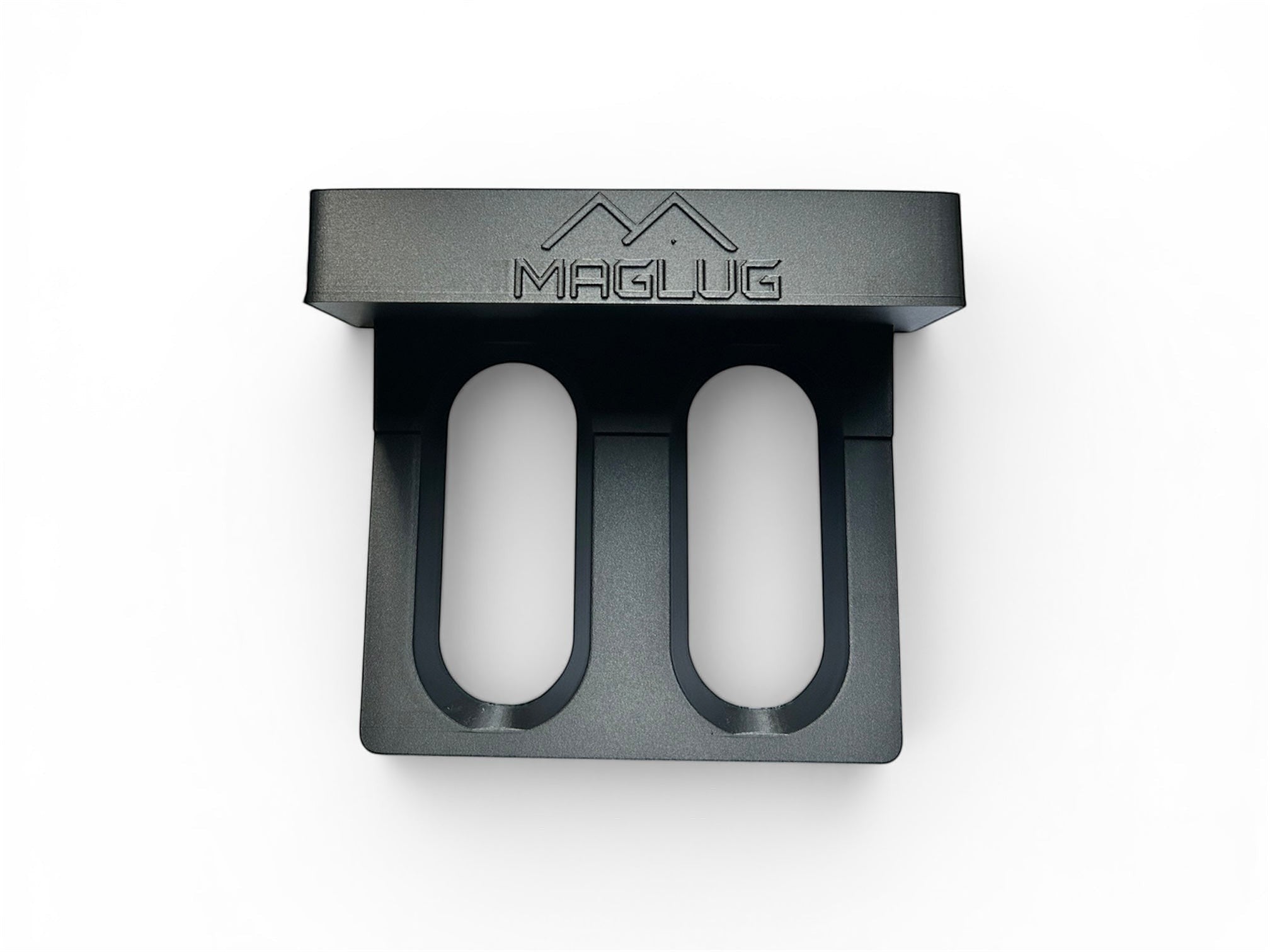 Cold Composites MagLug magnetic tool belt mount in matte black, made of carbon fiber reinforced composite.