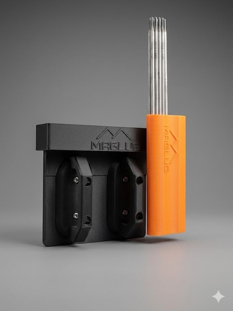 Cold Composites MagLug Magnetic Workstation in black, holding an orange tool holder with metal rods.